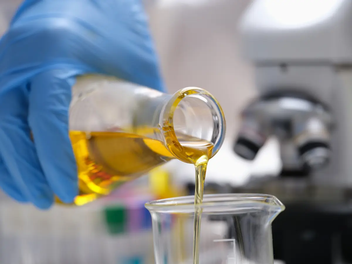Industrial lubricating oil being prepared for condition testing